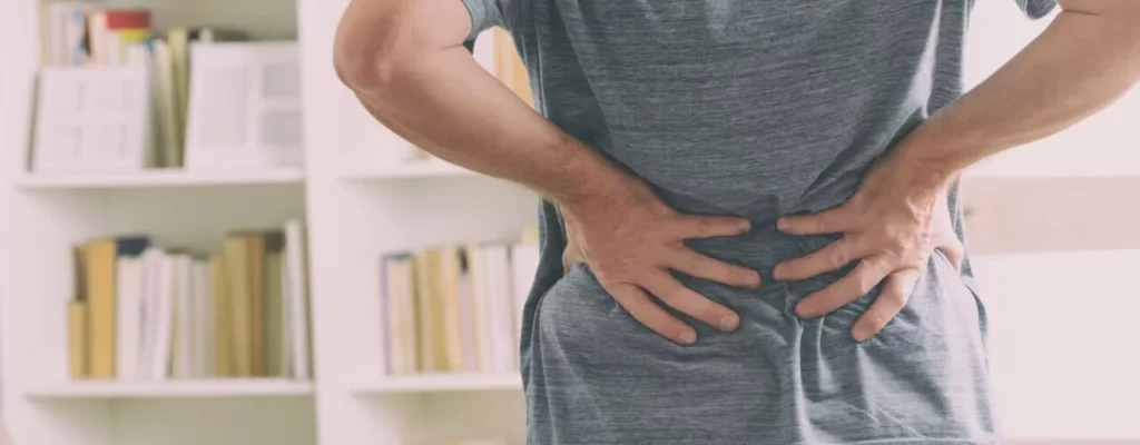 A man with sciatica pain